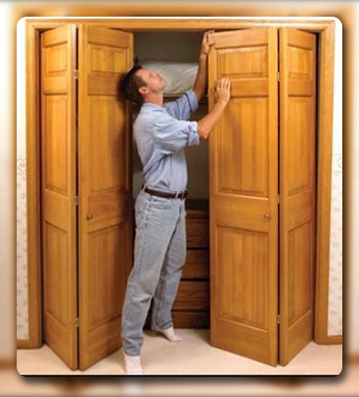 A person standing in a closet

Description automatically generated